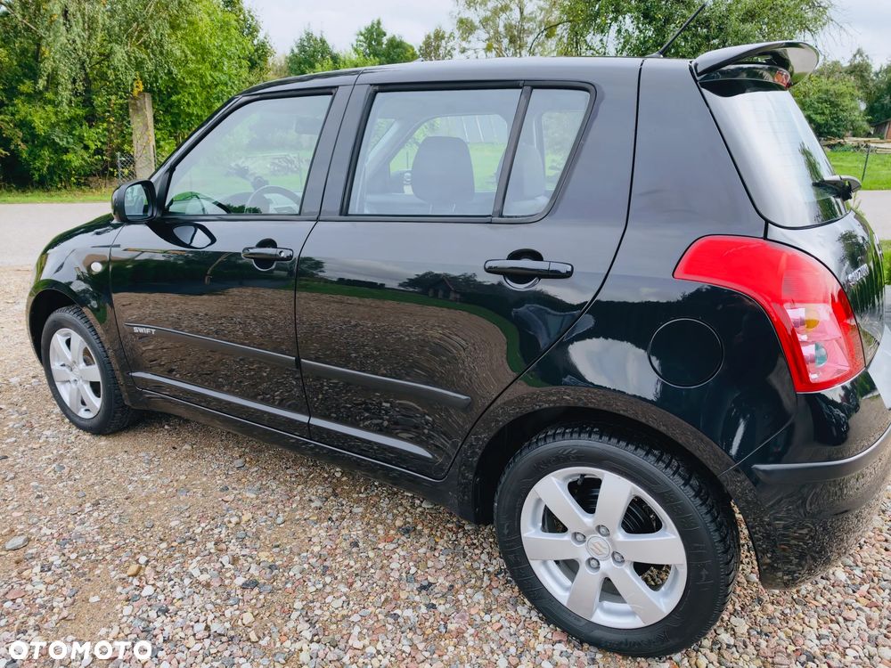 Suzuki Swift 1.3 GS / Premium 4WD - 1