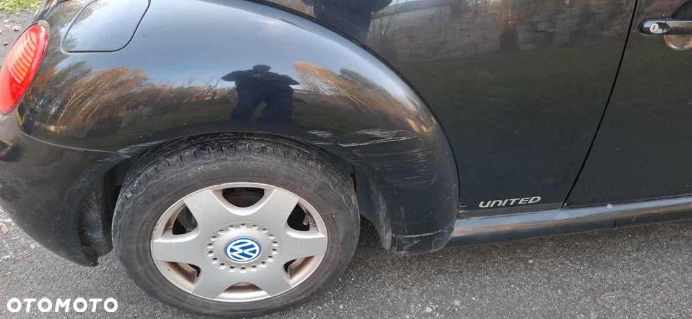Volkswagen New Beetle - 7