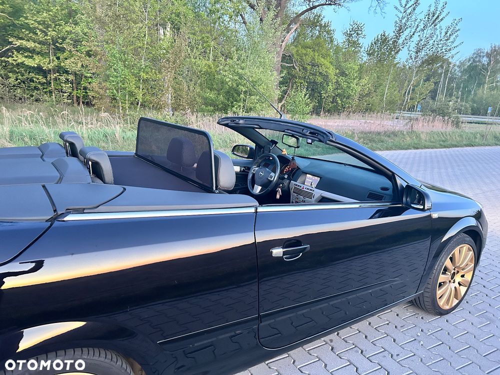 Opel Astra 1.8 Cosmo - 11
