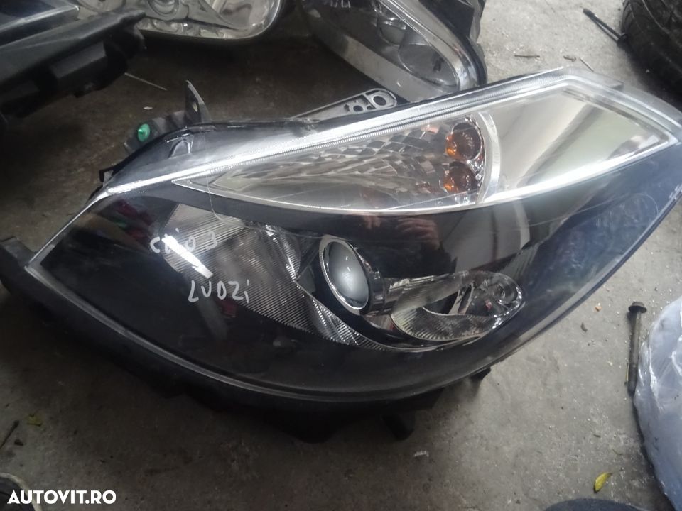 Vand Far Stanga cu Lupa Renault Clio 3 volan pe stanga din 2008 - 1