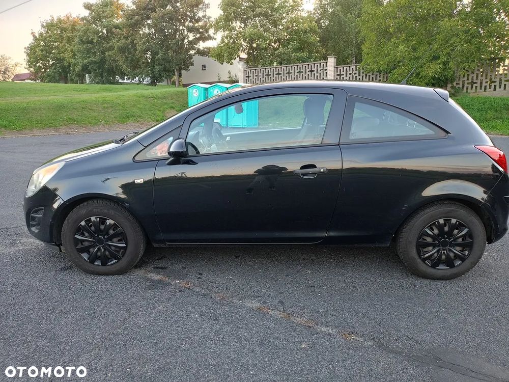 Opel Corsa 1.2 16V Enjoy - 11