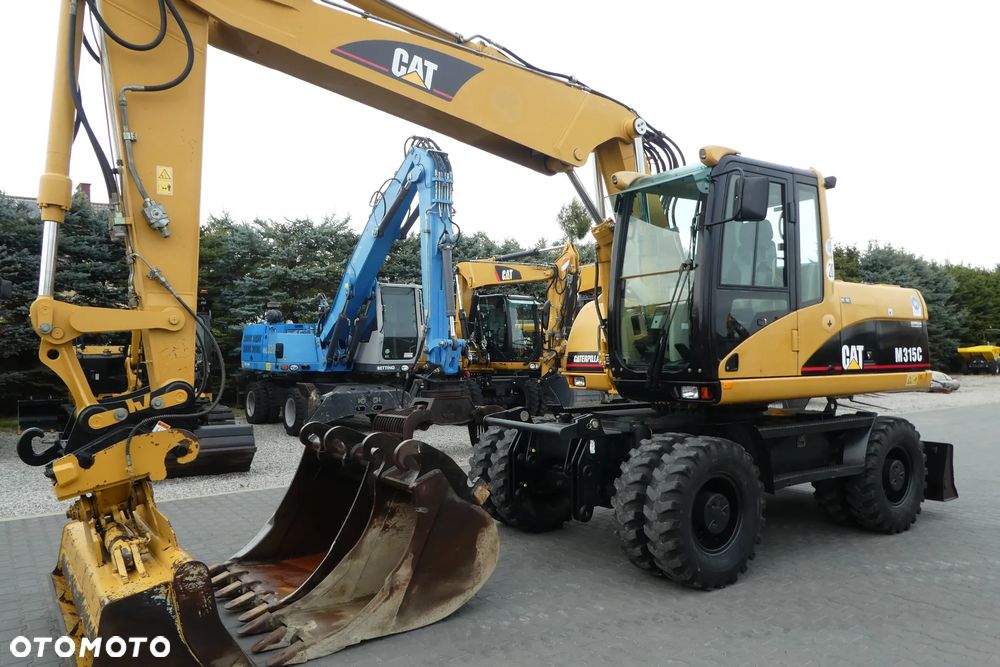 Caterpillar M315C Z NIEMIEC TRZY ŁYZKI - 3