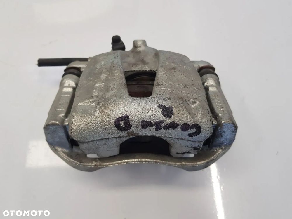 Zacisk hamulcowy jarzmo prawy przód OPEL CORSA D ADAM FIAT GRANDE PUNTO EVO PANDA 500 DOBLO FIORINO LINEA ALFA ROMEO MIT - 2