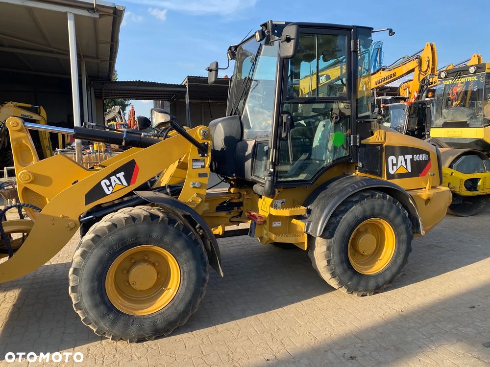 Caterpillar CAT 908H2, 6200 MTH, ŁYŻKA OTWIERANA + WIDŁY, z NIEMIEC, - 11