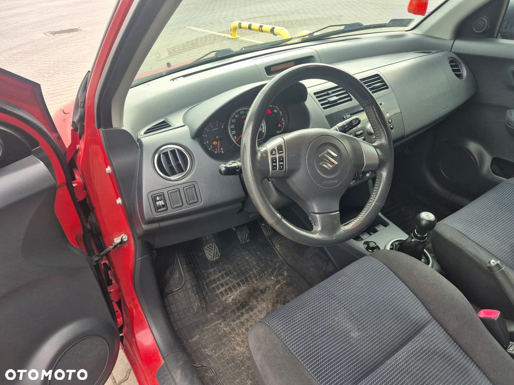 Suzuki Swift 1.3 Club - 11