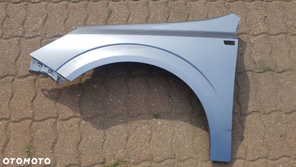 Błotnik przód  lewy  Opel Astra H III kod lakieru Z163 - 1
