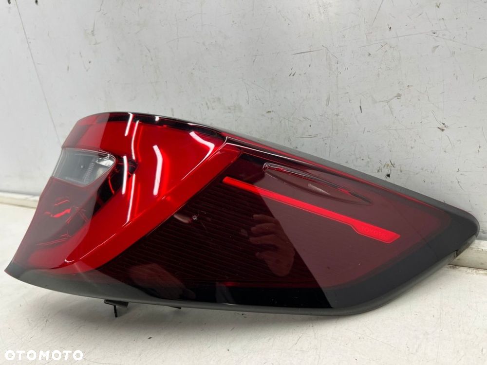 Lampa Toyota Corolla XII E21 kombi LIFT 22r.- PRAWA tylna w błotnik oryginalna Europa - 5