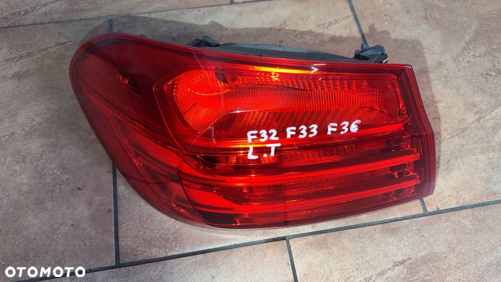 BMW F32 F33 F36 LAMPA W BŁOTNIK LEWA TYŁ 7296099 USA - 2