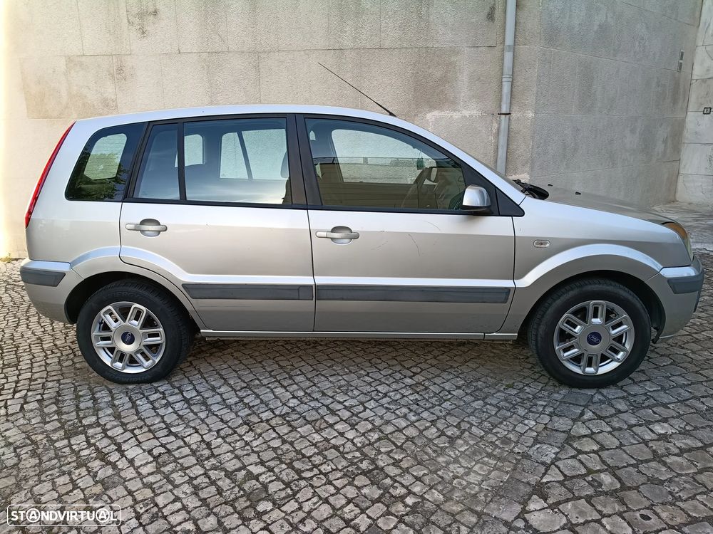 Ford Fusion 1.25 + - 14