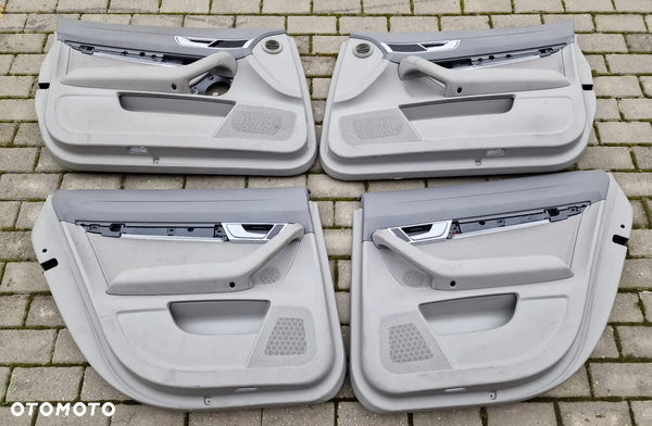 BOCZKI DRZWI KOMPLET PODŚWIETLANE AUDI A6 C6 KOMBI LIFT