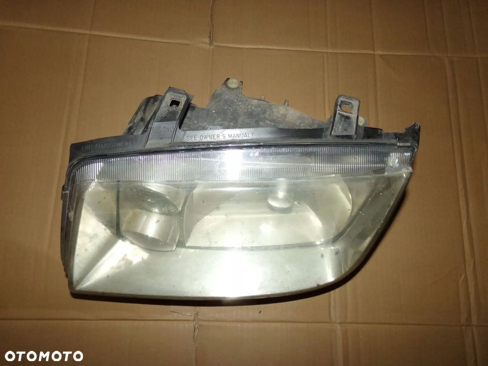 lampa lewa przód przednia vw bora - 3