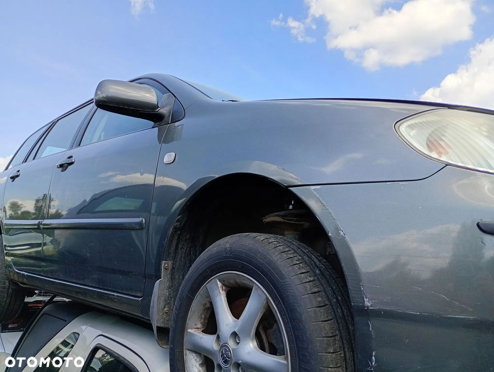TOYOTA COROLLA E12 KOMBI LIFT 04-07 1.4 D4D RADIO CD ORYGINALNE - 7