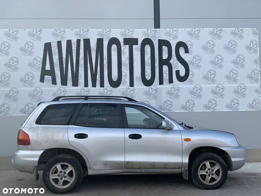 HYUNDAI SANTA FE 2001 *SAMOCHÓD NA CZĘŚCI*2484  MASKA, LAMPA, DRZWI, LUSTERKO, ZDERZAK, GRILL, BŁOTNIK, KLAPA, BELKA, DESKA, FOTELE, KANAPA, ĆWIARTKA, KIEROWNICA, TARCZE, ZACISKI, ZAWIESZENIE, KOMPLETNY PRZÓD, KOMPLETNY TYŁ, LICZNIK, ZEGARY, PRAWE LEWE PRZÓD TYŁ - 3