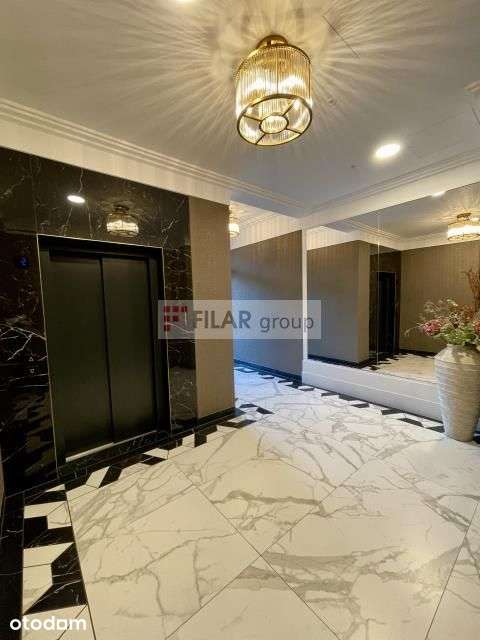 Apartament Dzielna 62, trzy pokoje garaż komórka l