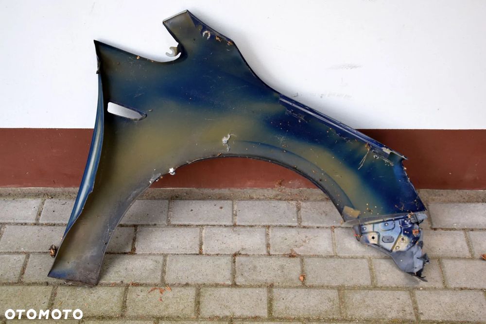 Opel Astra J Błotnik lewy przód przedni Z20Z niebieski - 6