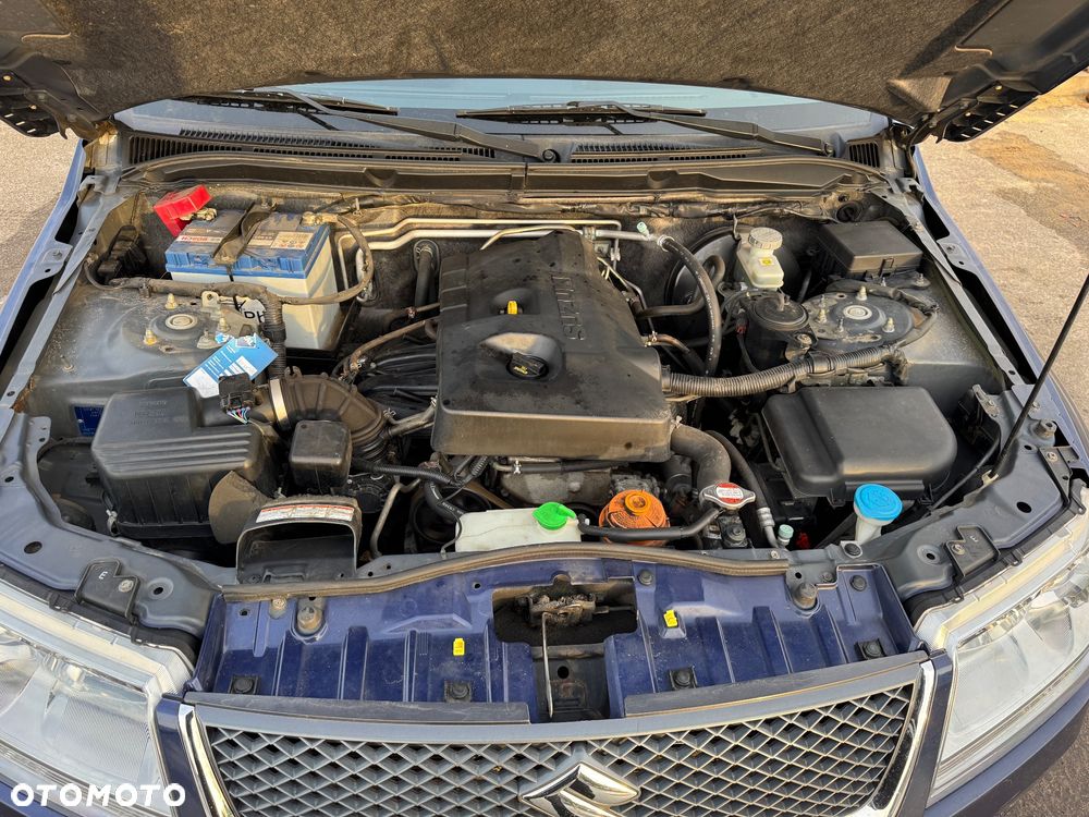 Suzuki Grand Vitara 2.0 Comfort + Family - 11