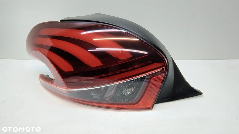 Lampa lewa tył PEUGEOT 208 I LIFT