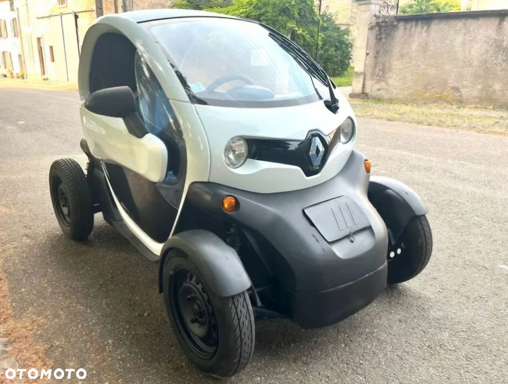 RENAULT TWIZY PLASTIK OBUDOWA KOLUMNA KOŁA ZACISK ZWROTNICA - 1