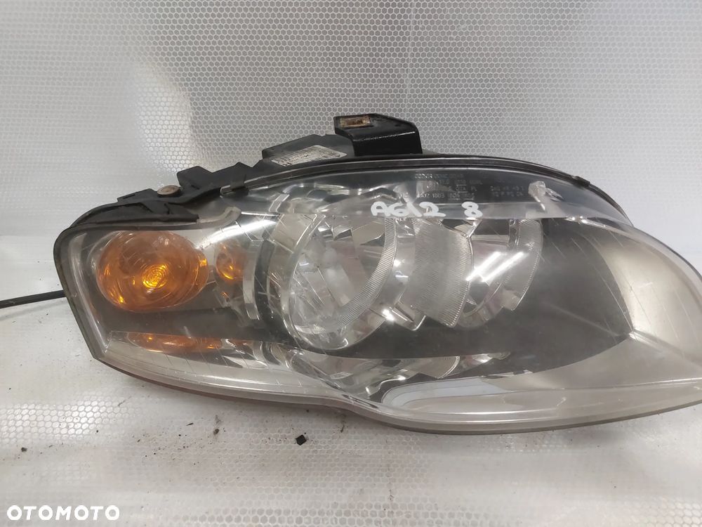 .  LAMPA PRZOD PRZEDNIA PRAWA AUDI A4 B7 - 2