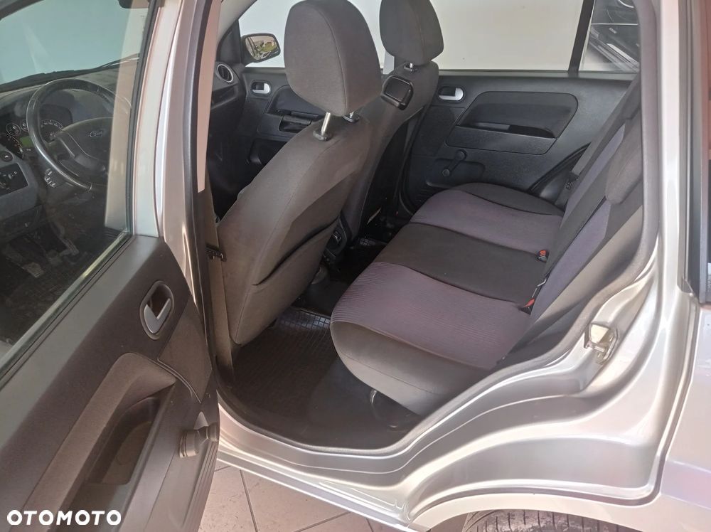 Ford Fusion 1.4 + - 13