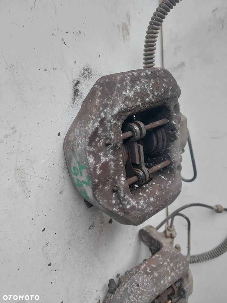 ZACISK HAMULCOWY LEWY PRAWY TYŁ VOLKSWAGEN TOUAREG 7L 3.0TDI - 2