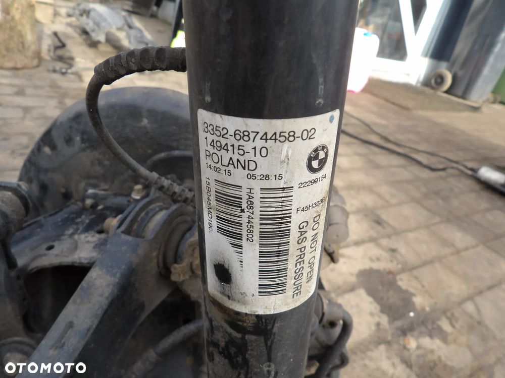 BMW - F45 - KOMPLETNE ZAWIESZENIE TYLNE - AMORTYZATORY , WÓZEK , SPRĘŻYNY , DRĄŻEK STABILIZATORA - 6874458  6874459  6853922 - 6