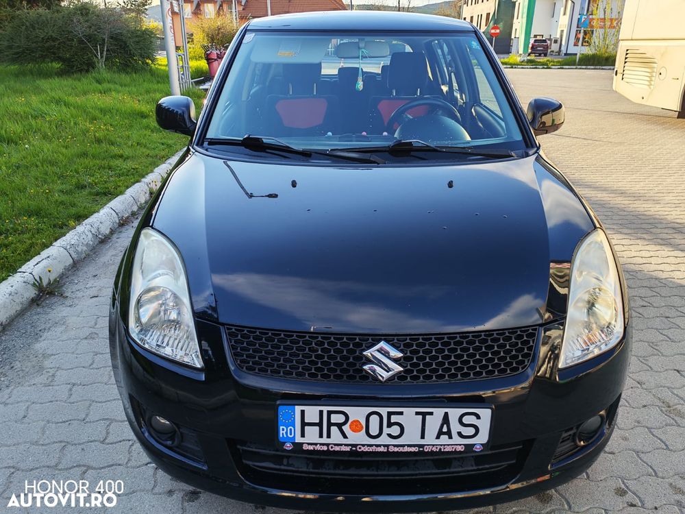 Suzuki Swift 1.3 GLX - 1
