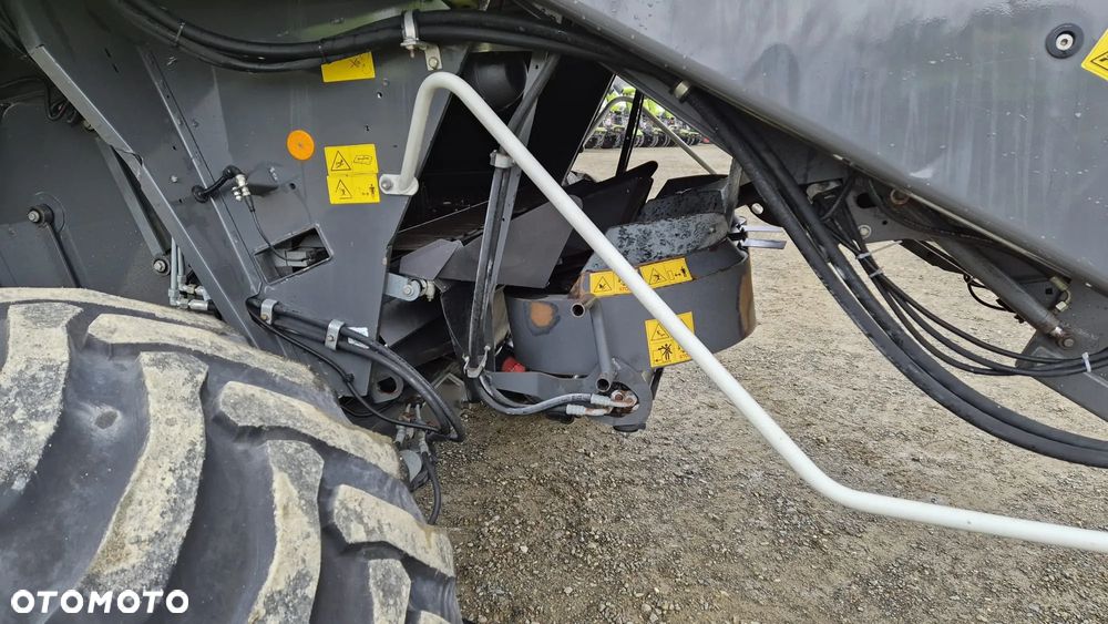Claas Lexion 600 z hederem - 13