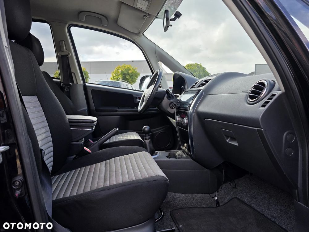 Suzuki SX4 1.6 Comfort Plus - 8