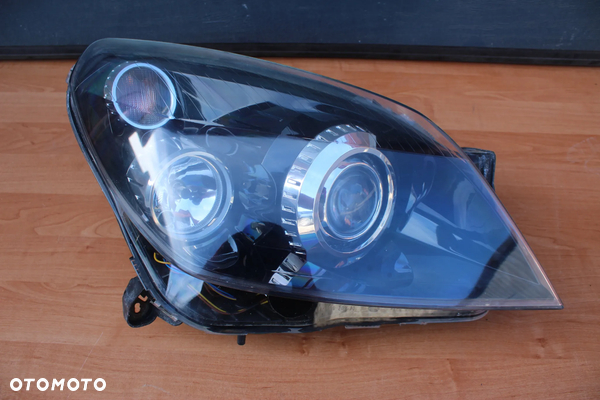 LAMPA PRAWA PRZEDNIA PRAWY PRZÓD BIXENON SKRĘTNY OPEL ASTRA H EUROPA 100% SPRAWNA ORYGINALNA