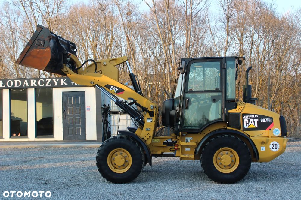 Caterpillar 907H2 Łyżka Widły Centralne Smarowanie Sprowadzona