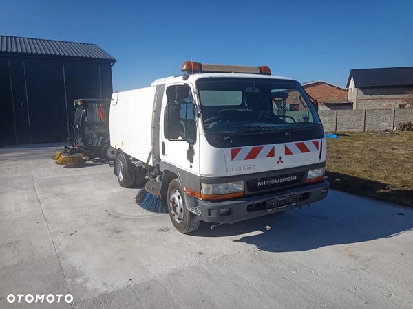 Mitsubishi Canter zamiatarka Johnston Schmidt Bucher zamiatanie ulic chodników