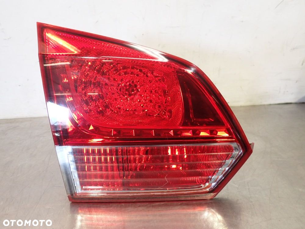 LAMPA LEWA TYLNA W KLAPIE CHEVROLET CRUZE I LIFT  95089901 - 1