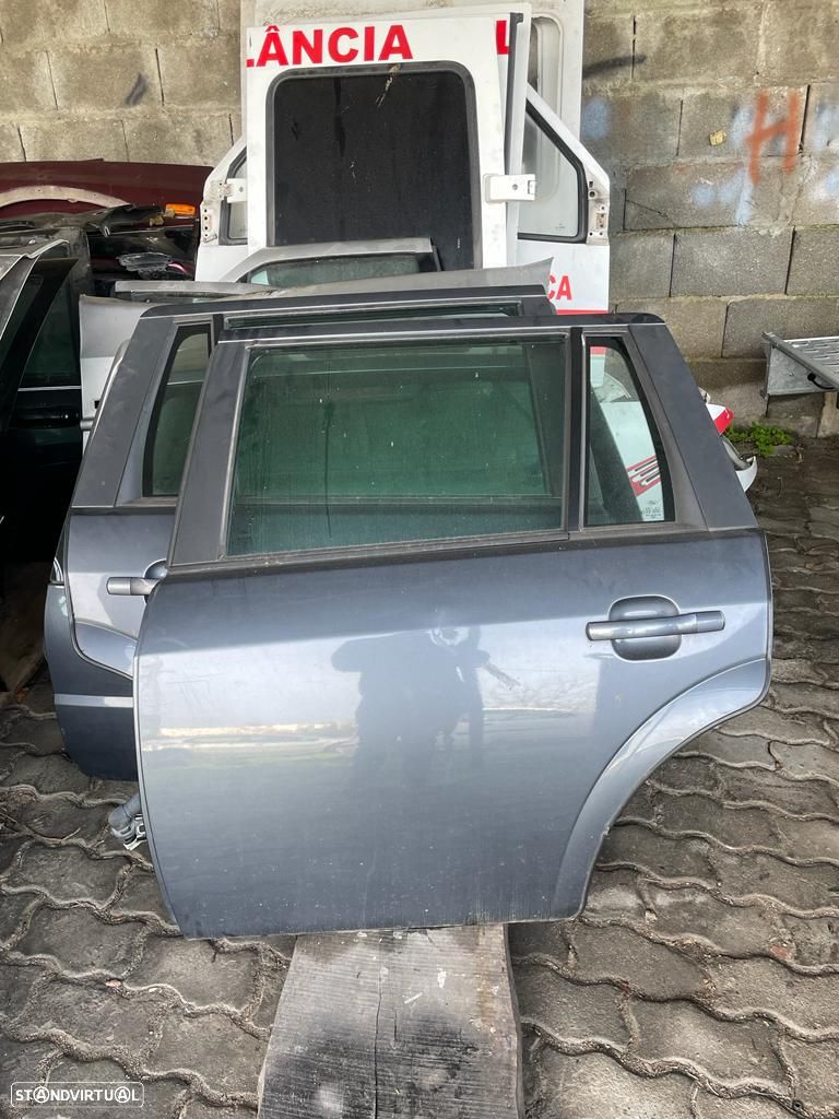 Porta traseira esq Ford Mondeo 2002-2007 carinha - 1