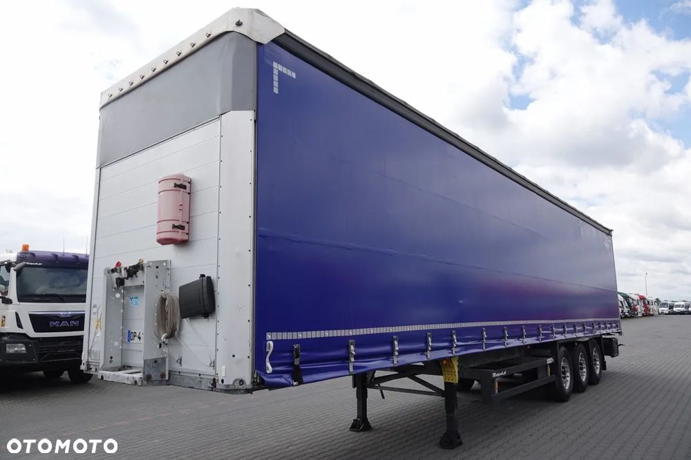 Schmitz Cargobull / FIRANKA / STANDARD / DWIE OSIE PODNOSZONE / - 4