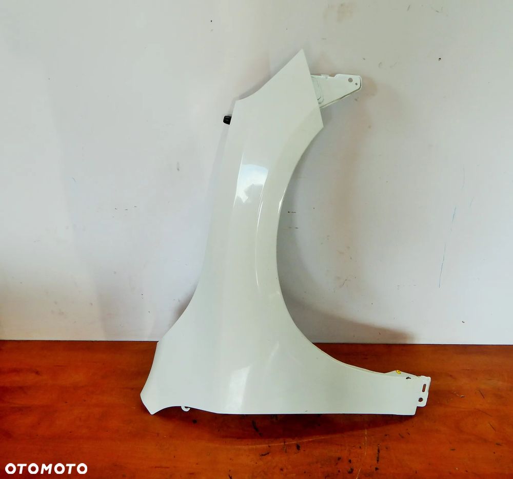 Błotnik prawy przód Volvo V60 S60 10-13 biały 614 Łuków części - 1