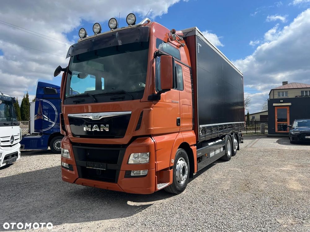 MAN TGX 26.480 / 6x2 / Burto - Firanka /