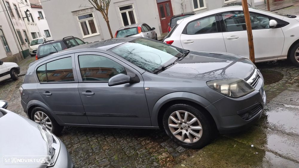 Opel Astra 1.3 CDTI Cosmo - 1