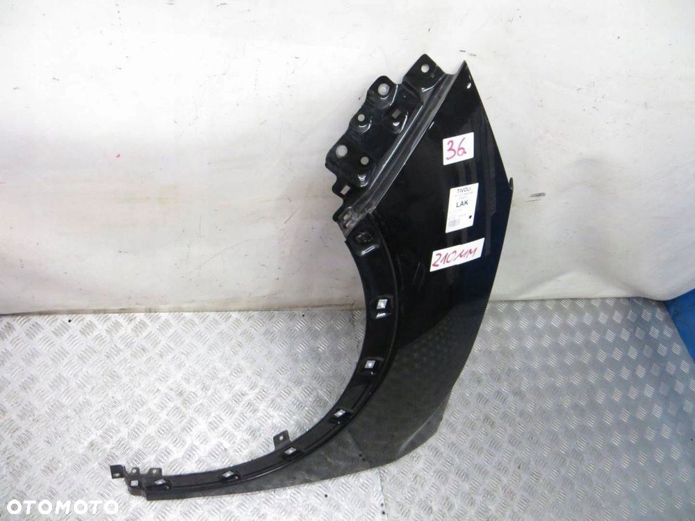 SSANGYONG TIVOLI BŁOTNIK LEWY PRZÓD LAK 14- - 5