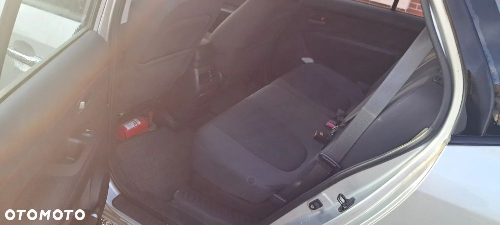 Kia Carens 2.0 CVVT EX Top - 7