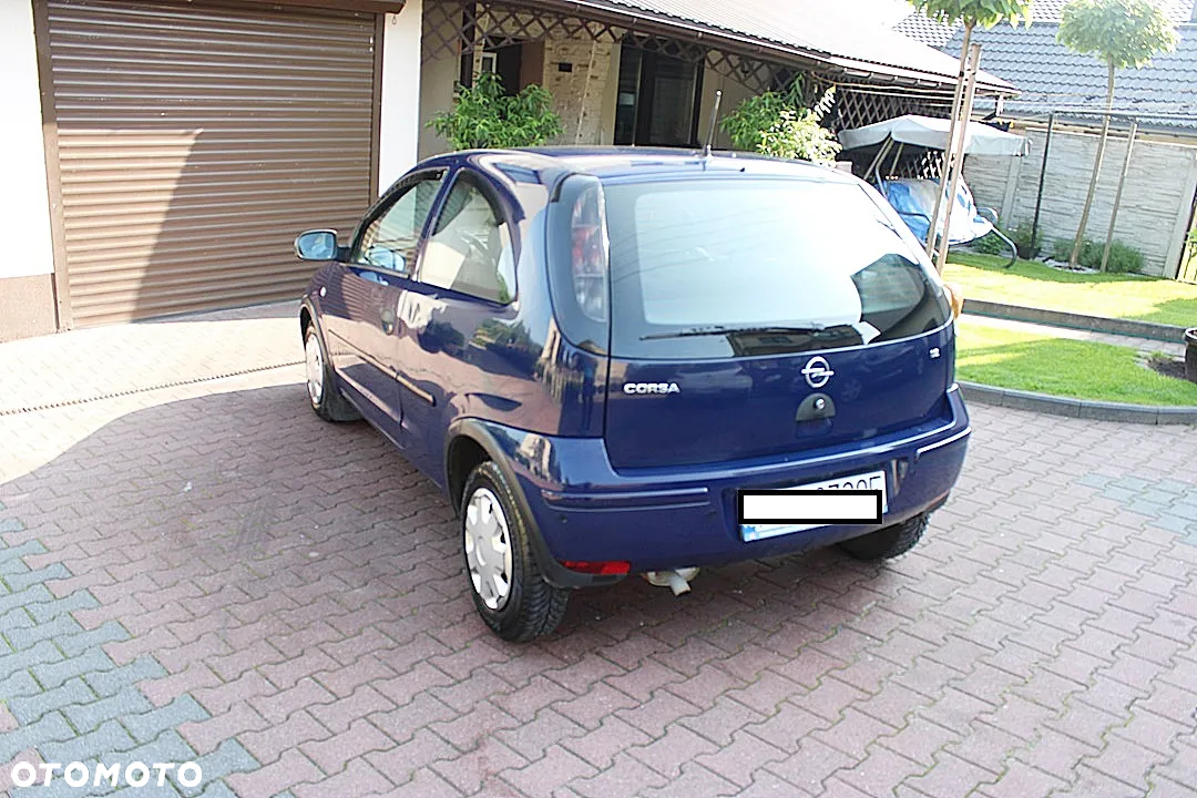 Opel Corsa 1.2 16V Cosmo - 7