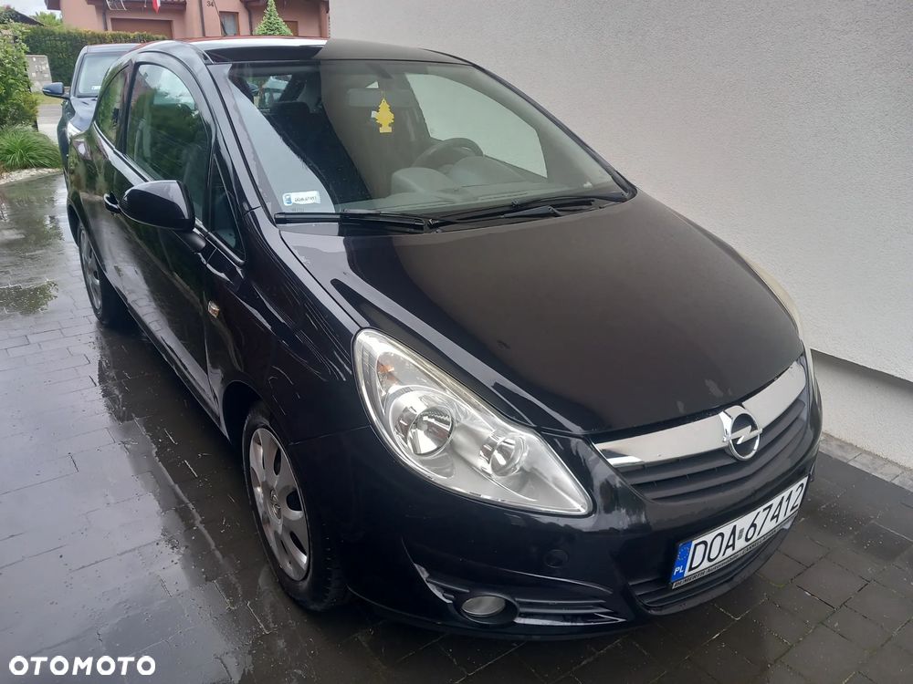Opel Corsa 1.2 16V Cosmo - 1