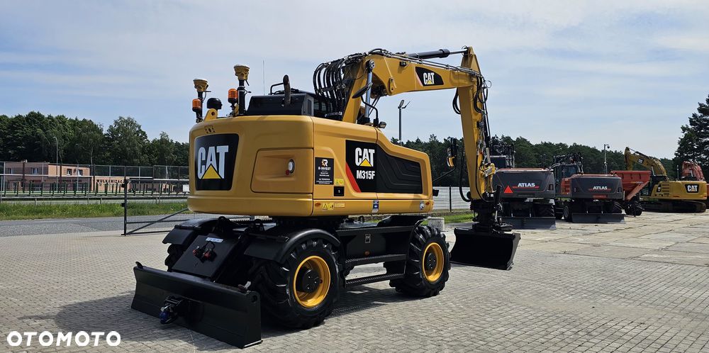 Caterpillar M315F (315F, M314F, M317F) TRIMBLE ROTOTILT TRS10 PRZYCZEPA - 11