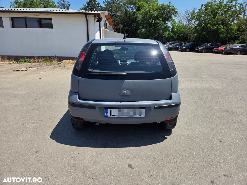 Opel Corsa 1.2i Cosmo - 5