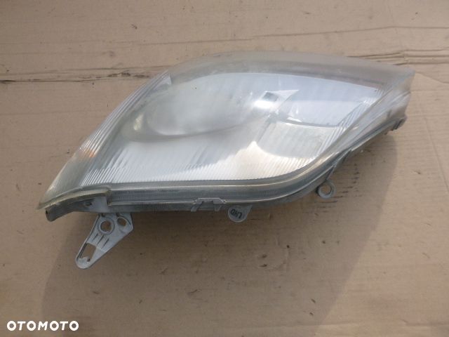 LAMPA LEWY PRZÓD LEWA PRZEDNIA TOYOTA COROLLA E12 01- - 10