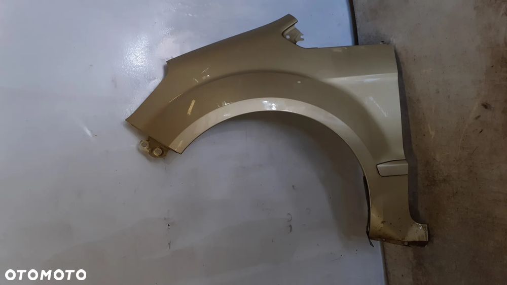 * BŁOTNIK PRZÓD PRZEDNI  LEWY FORD GALAXY MK2 II  ZŁOTY PIASKOWY ZGIETA STOPA - 1