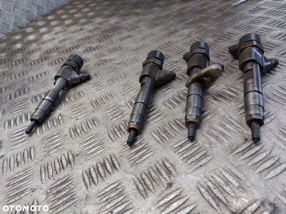 WTRYSKIWACZ KOMPLET USZKODZONY SCENIC II 1.9 DCI 7700111014 8200100272 - 2