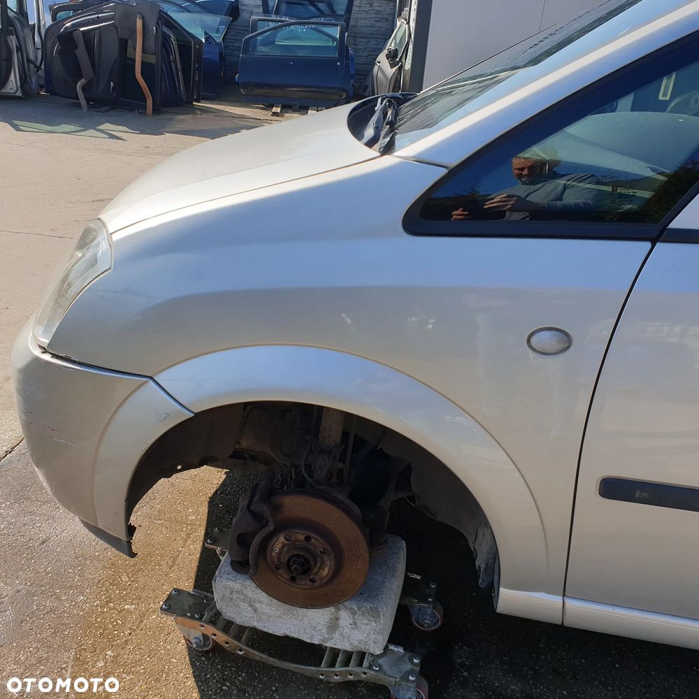 OPEL MERIVA A BLOTNIK LEWY  PRZOD   Z157 04R - 1