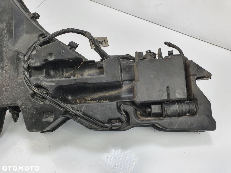 ZBIORNICZEK SPRYSKIWACZY CADILLAC CTS 4X4 RWD - 2
