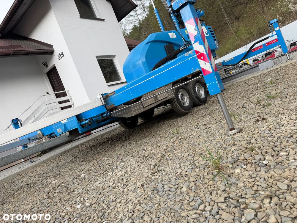 KLAAS 21/31TSP Dźwig Dekarski żuraw zwyżka podnośnik 31m. udźwig 1800kg max. Silnik Yanmar 3cyl. Dźwig Sterowany całkowicie zdalnie z pilota. Do 3,5 tony Transportowanie samochodem osobowym! Podwieszana oś Hydr. Własny Napęd Hydr. na 2 koła w terenie. Maszyna jak Nowa 2,5 tyś mtg. 2013r. Po serwisach Dekra BMWT. Sprowadzona z Norwegii. Nie różni się od nowej z salonu. Pełna Hydraulika w maszynie. Najbogatsza wersja. OKAZJA 230volt. Zero zużycia! - 20